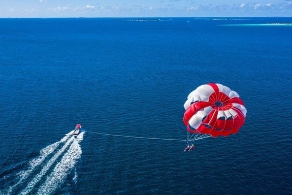 a parachute with a body of water