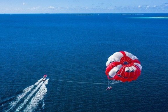 a parachute with a body of water